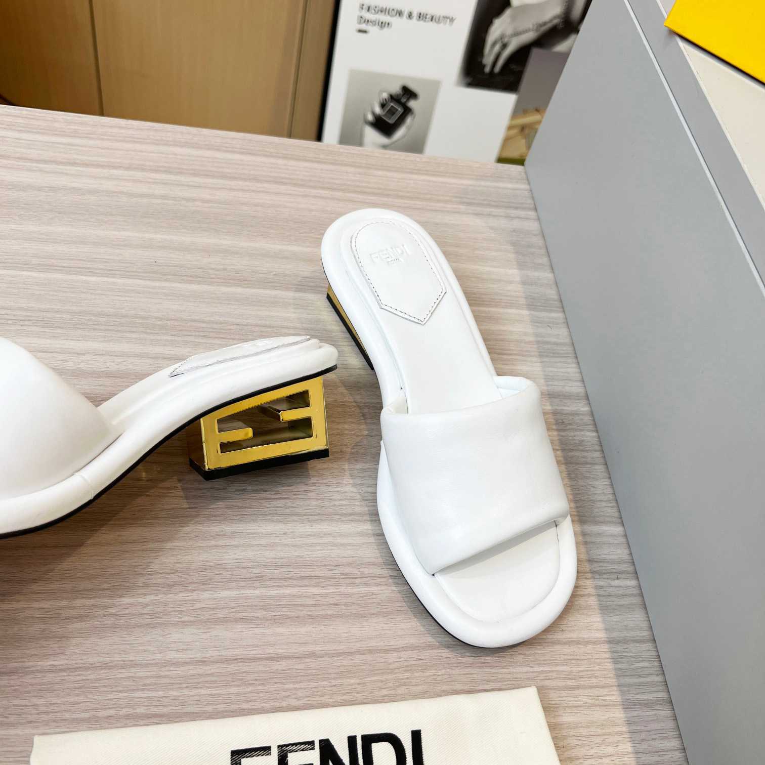 Fendi Baguette White Nappa Leather Slides - EUR FASHION