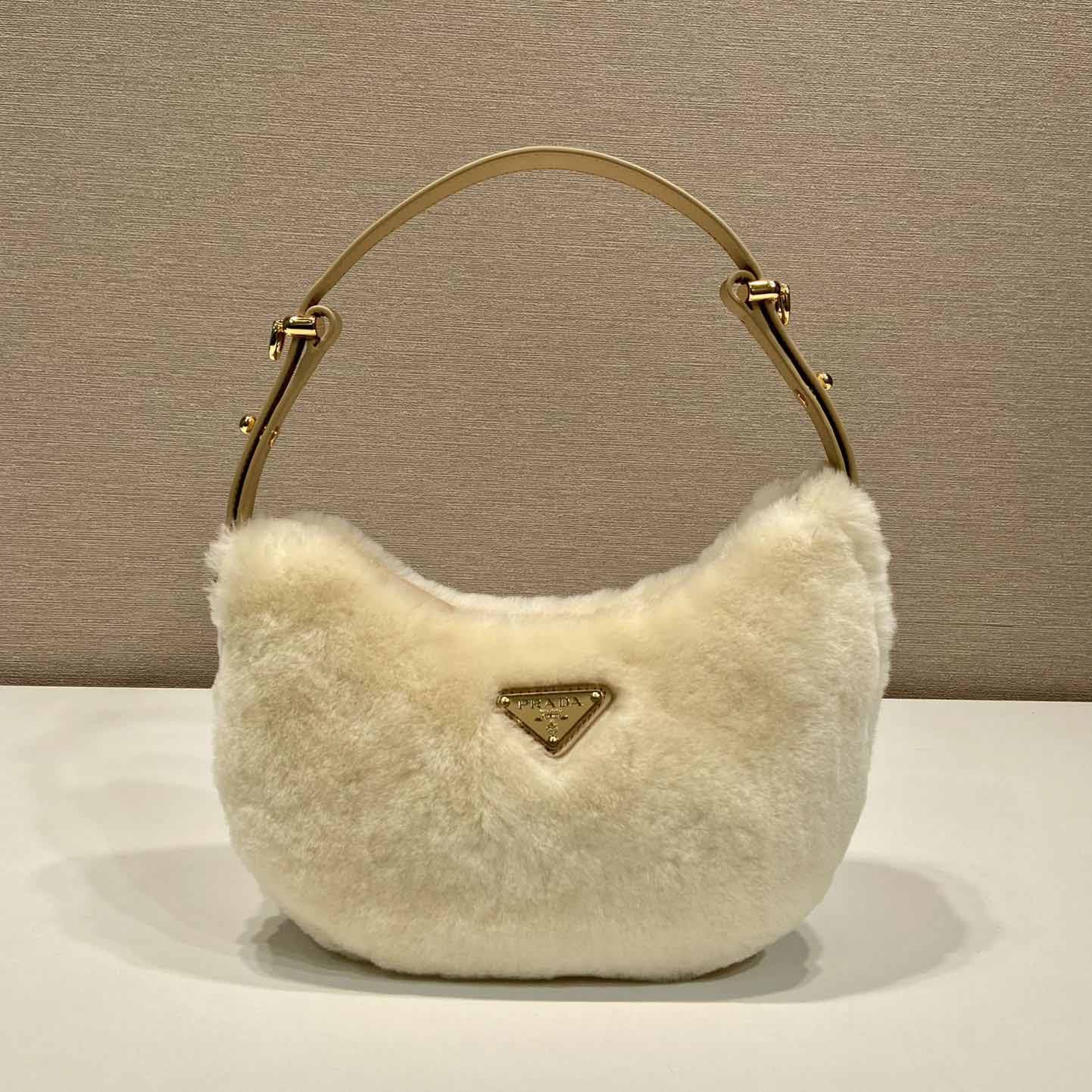 Prada Arqué Shearling And Leather Shoulder Bag - EUR FASHION