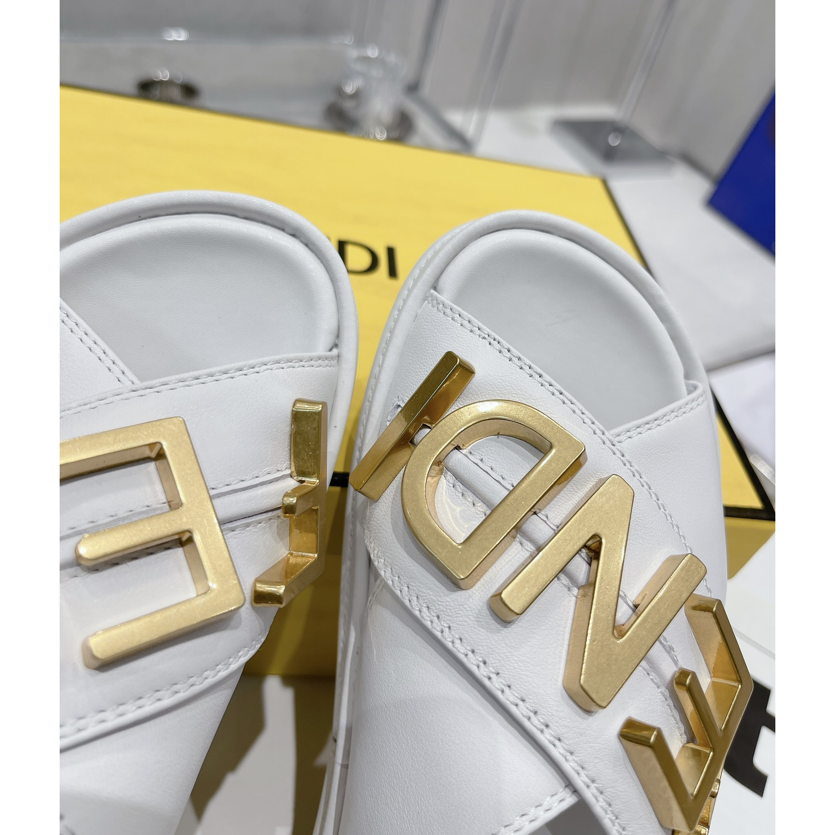 Fendi Graphy White Leather Slides - EUR FASHION