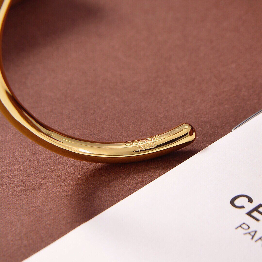 Celine Maillon Triomphe Thin Cuff In Brass With Gold Finish - EUR FASHION