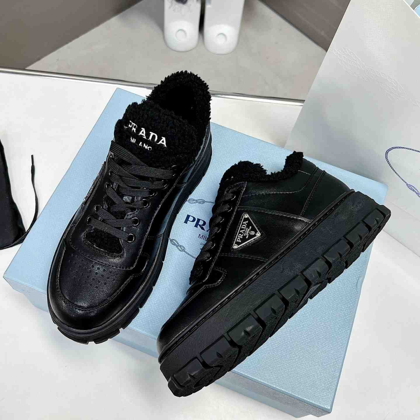 Prada Leather And Shearling Sneakers - EUR FASHION