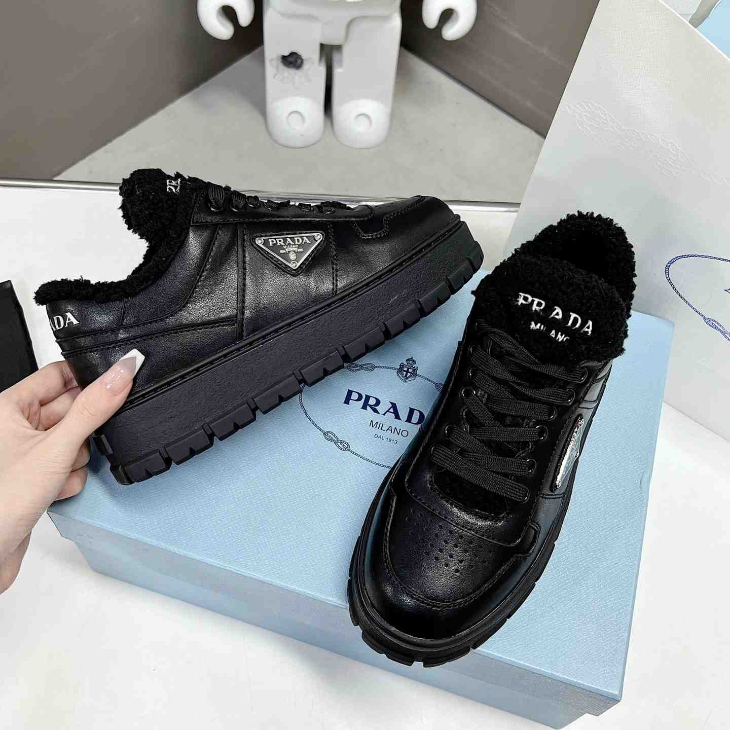 Prada Leather And Shearling Sneakers - EUR FASHION