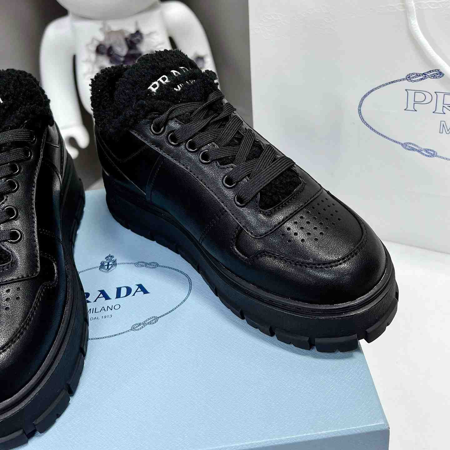 Prada Leather And Shearling Sneakers - EUR FASHION