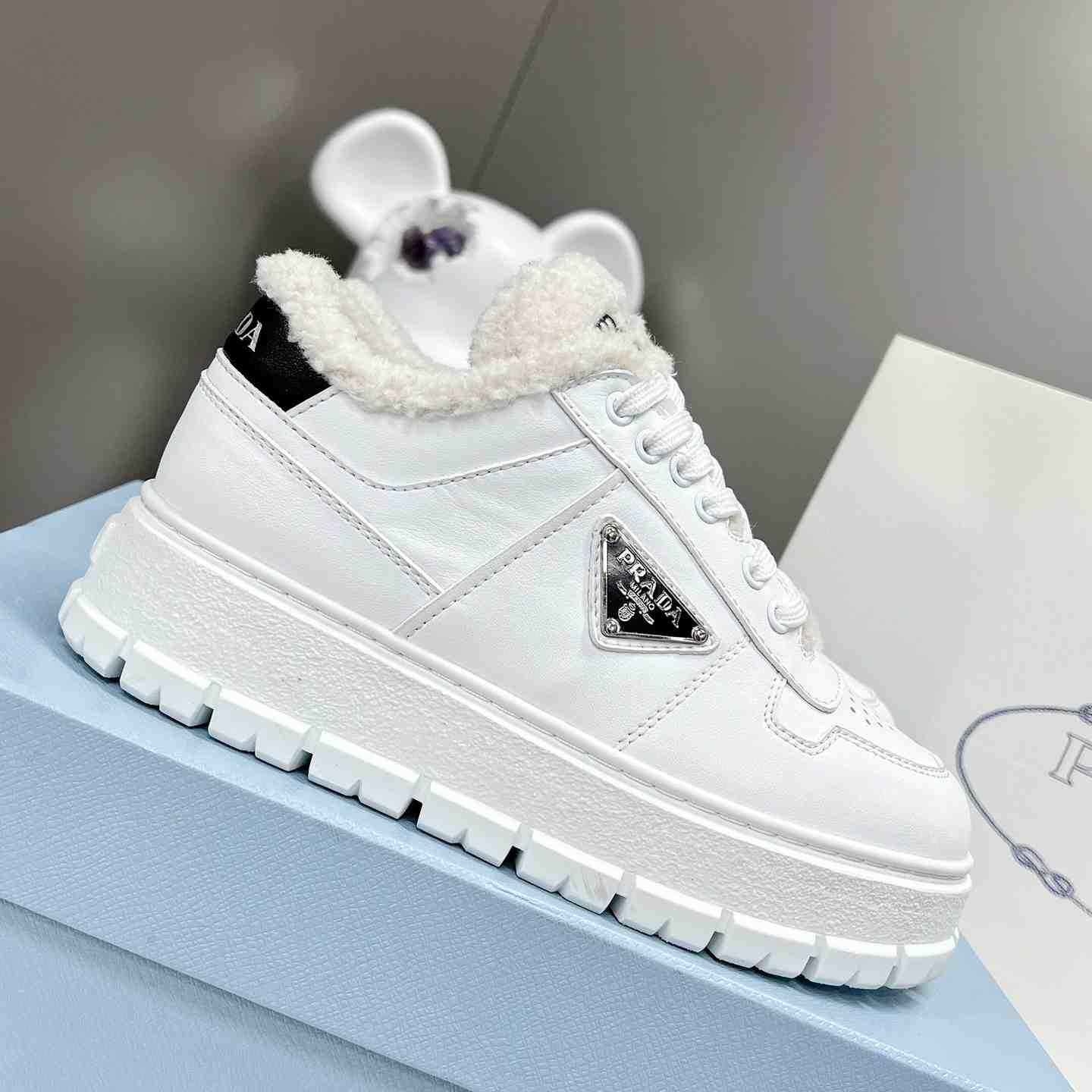 Prada Leather And Shearling Sneakers - EUR FASHION