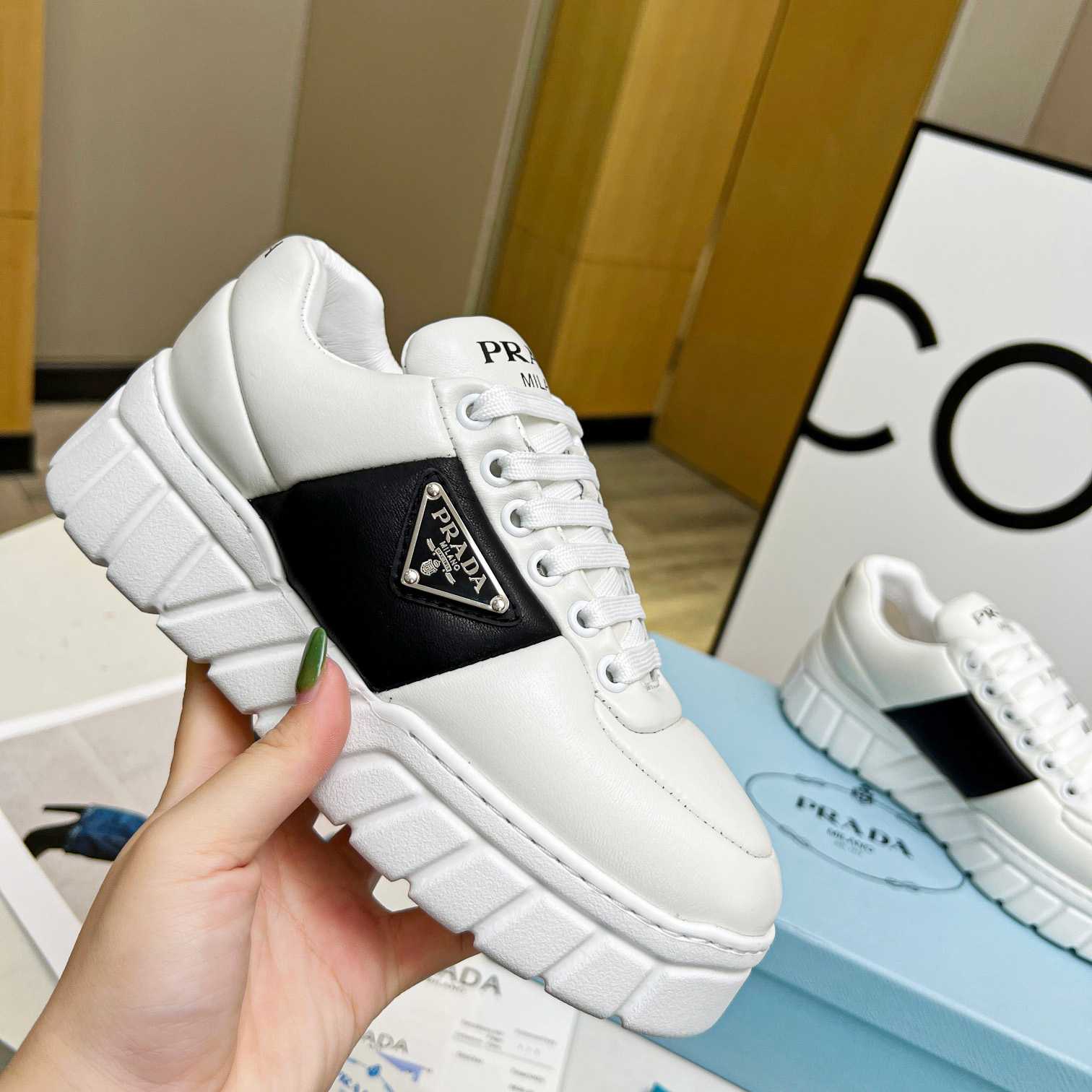 Prada Padded Nappa Leather Sneakers - EUR FASHION