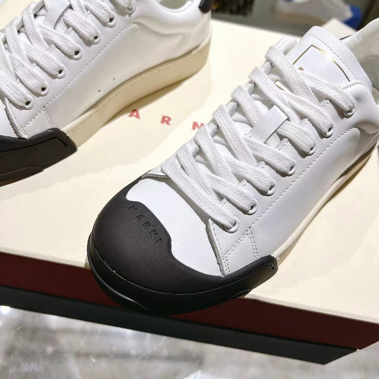 Marni Dada Bumper Sneaker In White And Black Leather - EUR FASHION