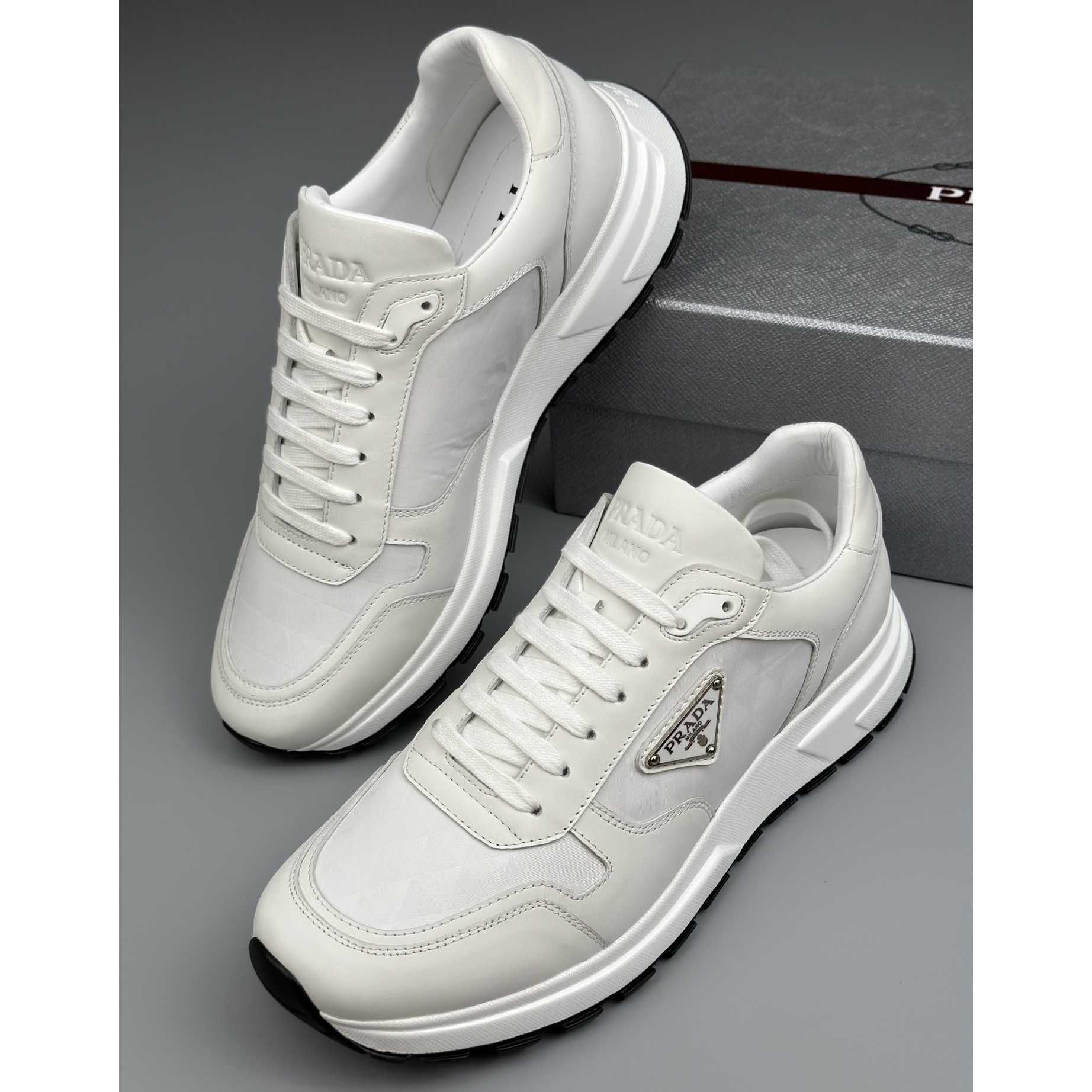 Prada Leather And Re-Nylon High-top Sneakers - EUR FASHION