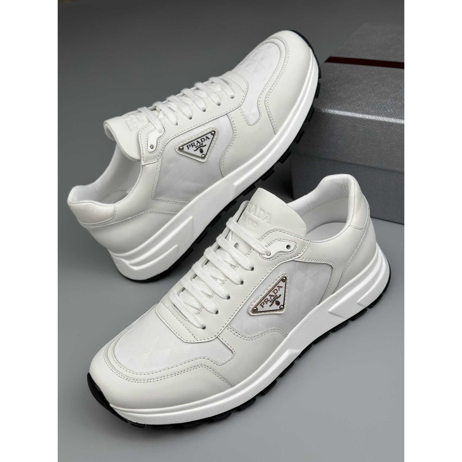 Prada Leather And Re-Nylon High-top Sneakers - EUR FASHION