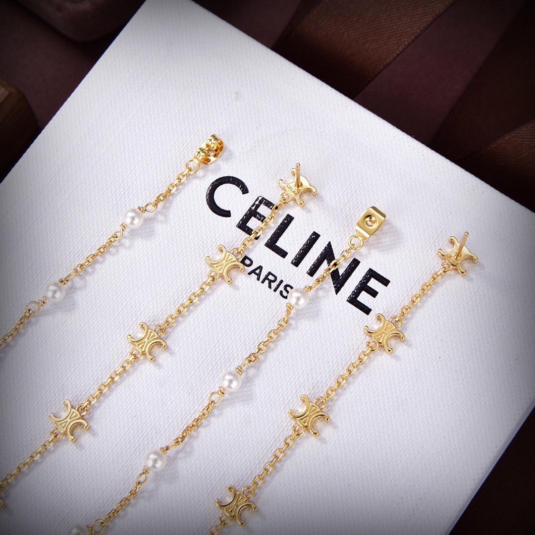 Celine Triomphe Long Pearl Earrings In Brass With Gold Finish And Resin Pearls - EUR FASHION