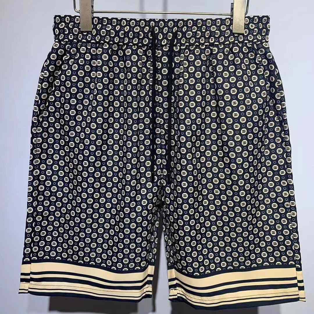 Dolce & Gabbana Silk Twill Jogging Shorts With DG Logo Print - EUR FASHION